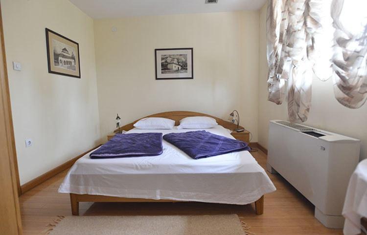 Postel nebo postele na pokoji v ubytování Motel Kneginja