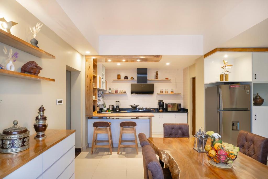 Kuchyň nebo kuchyňský kout v ubytování Atisha Hotel