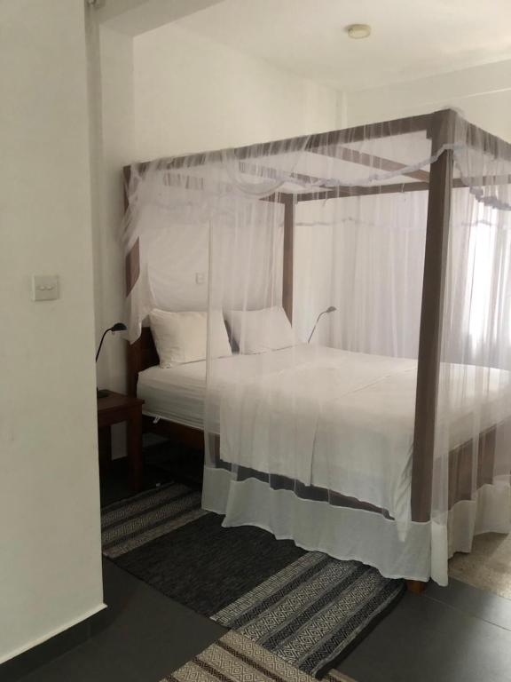 Postel nebo postele na pokoji v ubytování Hotel Paradiso,