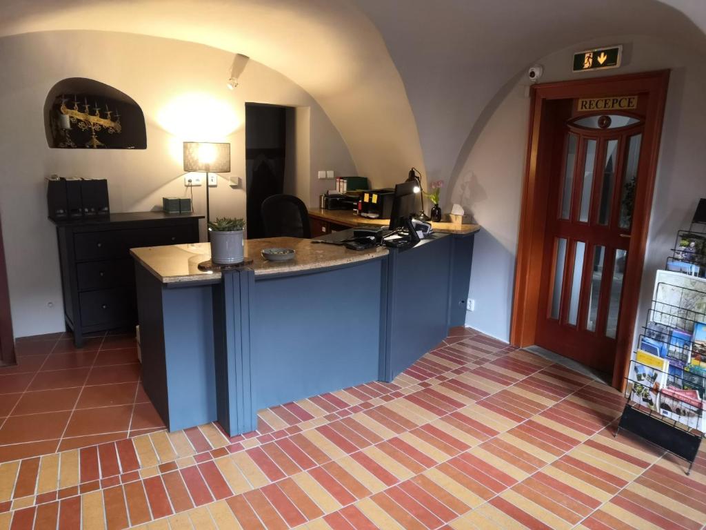 Kuchyň nebo kuchyňský kout v ubytování Boutique Hotel Templ
