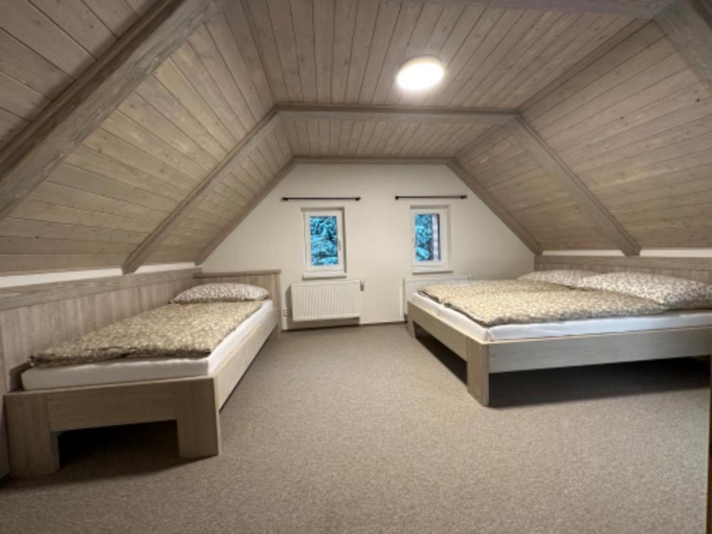 Postel nebo postele na pokoji v ubytování Apartmány VESNA