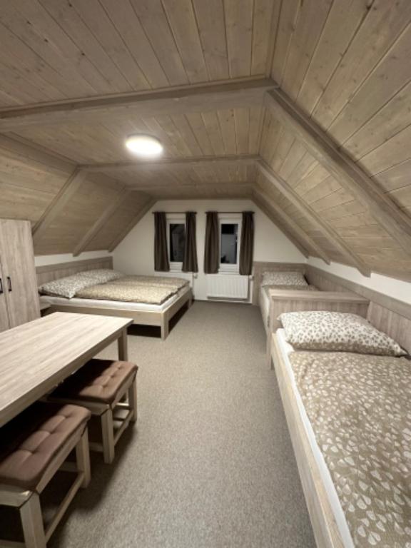 Postel nebo postele na pokoji v ubytování Apartmány VESNA