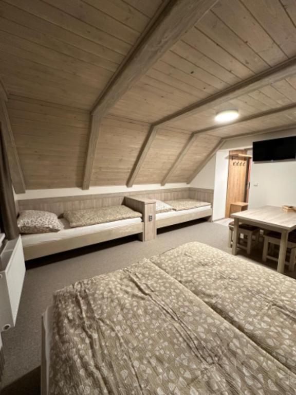 Postel nebo postele na pokoji v ubytování Apartmány VESNA