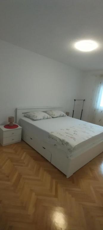 Postel nebo postele na pokoji v ubytování Apartman Makarska