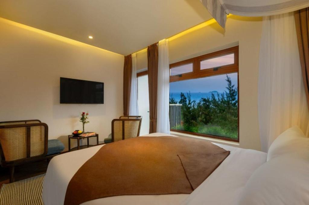 Postel nebo postele na pokoji v ubytování HA Hotel Apartments Ocean Front