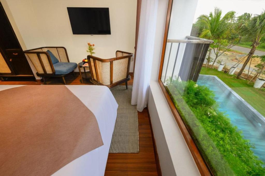 TV a/nebo společenská místnost v ubytování HA Hotel Apartments Ocean Front