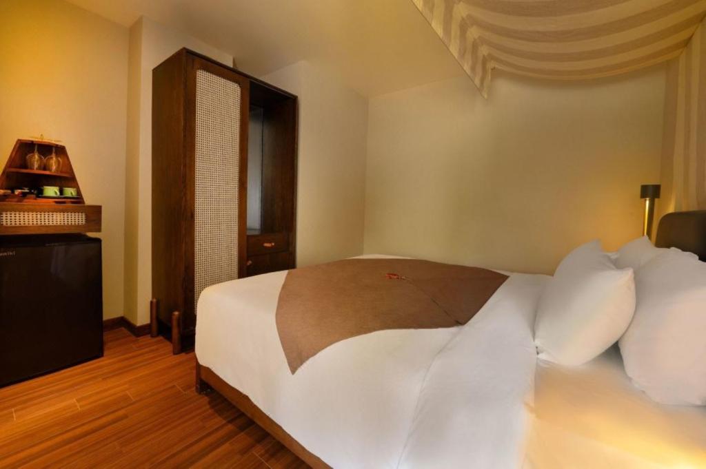 Postel nebo postele na pokoji v ubytování HA Hotel Apartments Ocean Front