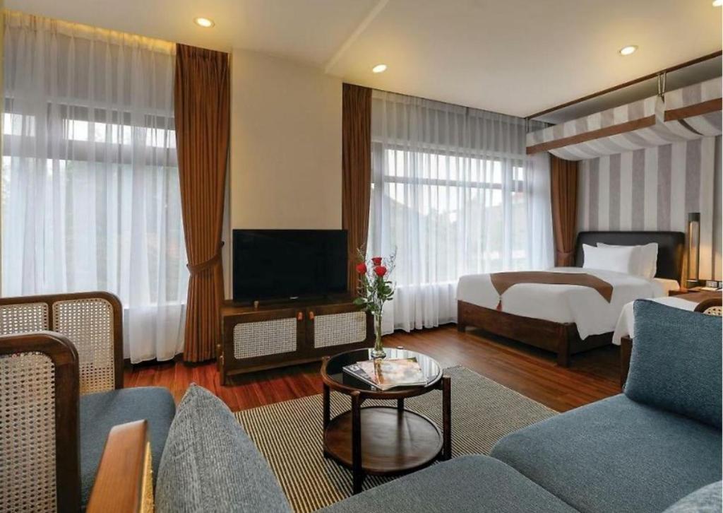 TV a/nebo společenská místnost v ubytování HA Hotel Apartments Ocean Front