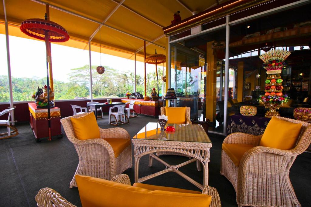 Area soggiorno di Tanah Merah Art Resort by AGATA