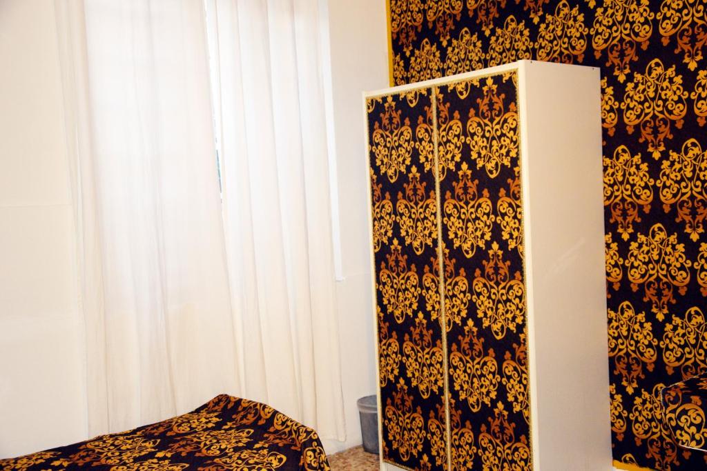 Postel nebo postele na pokoji v ubytování Venice Rainbow Apartment San Marco