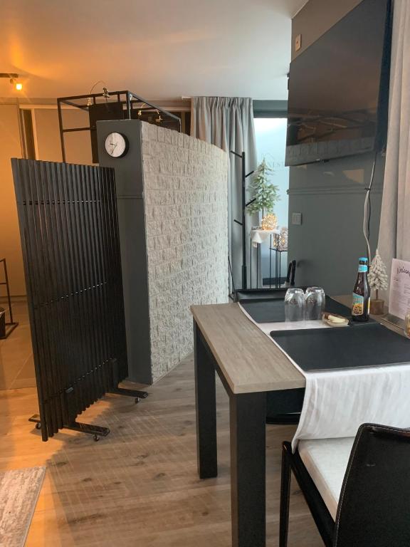 Kuchyň nebo kuchyňský kout v ubytování Guestsuite The Nest