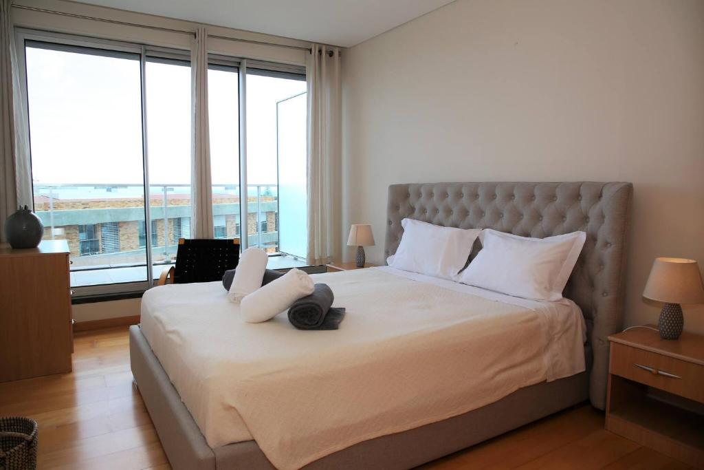 Postel nebo postele na pokoji v ubytování Rooftop Terrace Apartment PDL