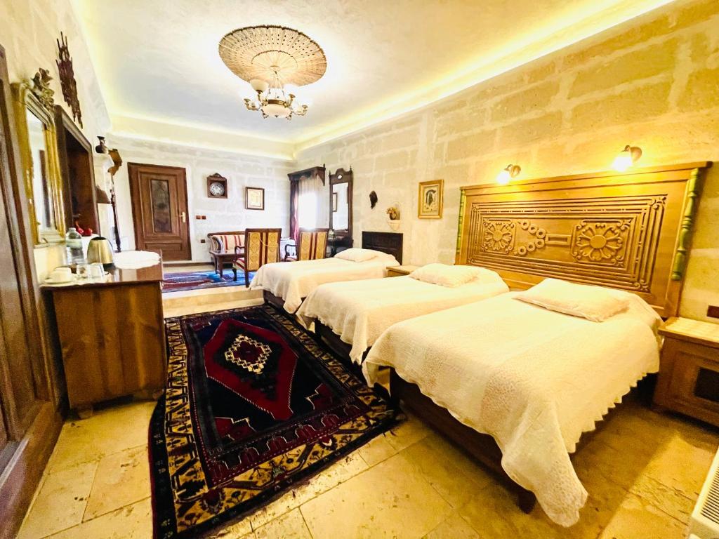 Postel nebo postele na pokoji v ubytování Sofa Hotel