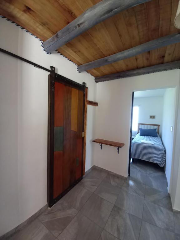 Postel nebo postele na pokoji v ubytování La Rosa del Azafrán - Alojamiento Rural - Ranchos de Vacaciones en Entre Ríos