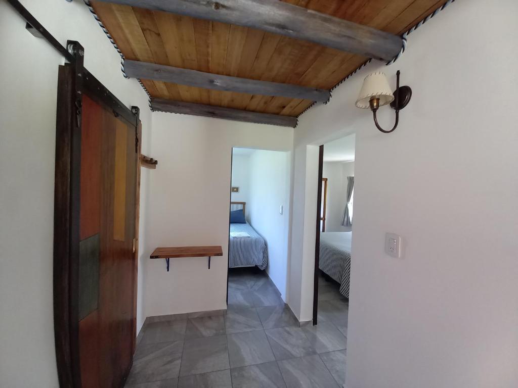 Postel nebo postele na pokoji v ubytování La Rosa del Azafrán - Alojamiento Rural - Ranchos de Vacaciones en Entre Ríos