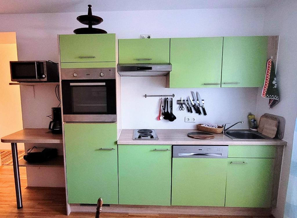 Kuchyň nebo kuchyňský kout v ubytování Obersdorfer Hof