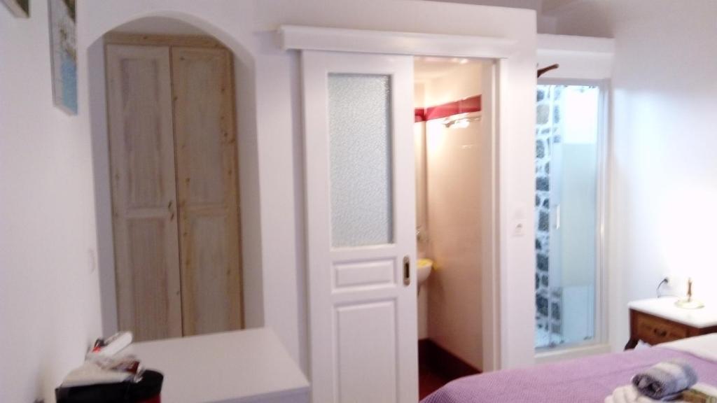 Кровать или кровати в номере ZACHAROULA ROOMS 2