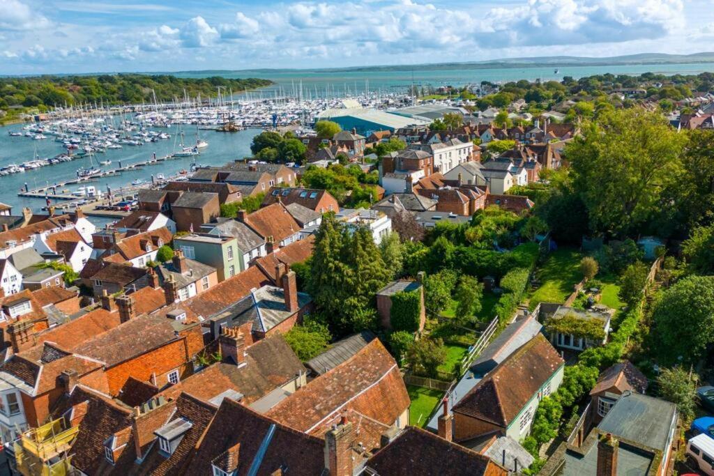 an aerial view of a town with a harbor at Stunning Luxury Apartment in Central Lymington in Lymington