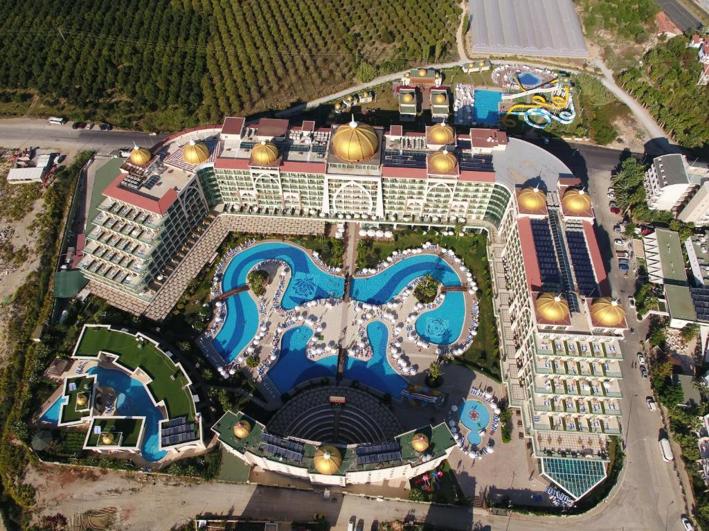 an aerial view of a resort with a pool at Alan Xafira Deluxe Resort & Spa-ULTRA ALL INCLUSIVE in Alanya