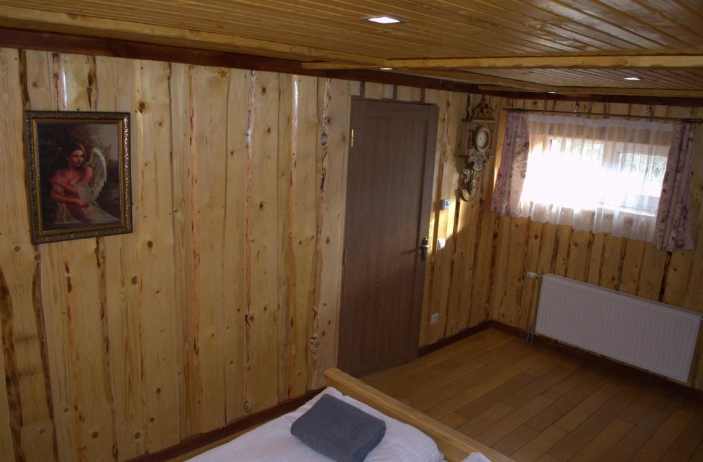 Postel nebo postele na pokoji v ubytování Pid Goroyu