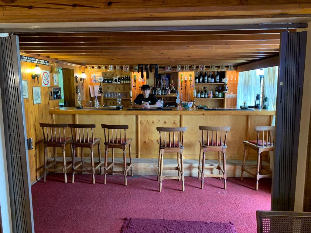 Lounge nebo bar v ubytování Hotel De Rust