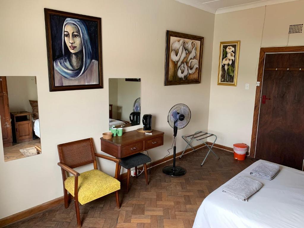 Postel nebo postele na pokoji v ubytování Hotel De Rust