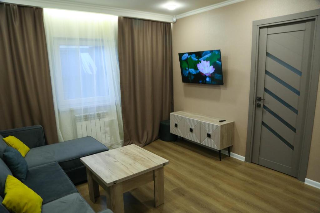 TV a/nebo společenská místnost v ubytování Bellissimo Garden Villa