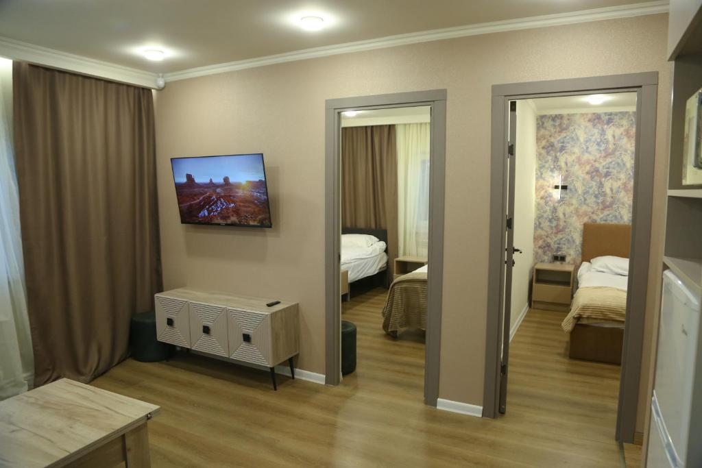 Postel nebo postele na pokoji v ubytování Bellissimo Garden Villa