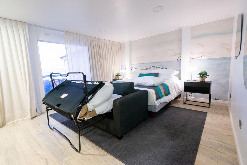 Postel nebo postele na pokoji v ubytování Nolana hotel