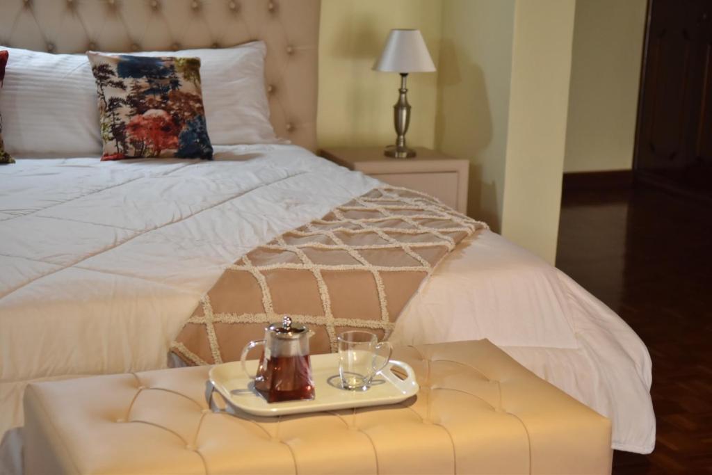 Postel nebo postele na pokoji v ubytování Venia Place
