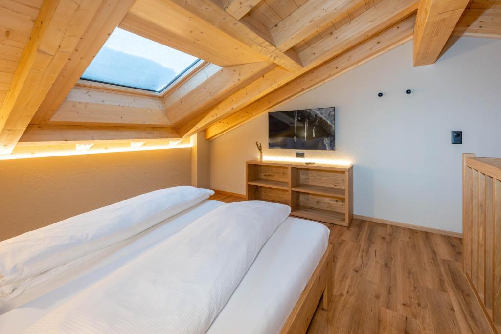 Televiisor ja/või meelelahutuskeskus majutusasutuses Mountain Lodge