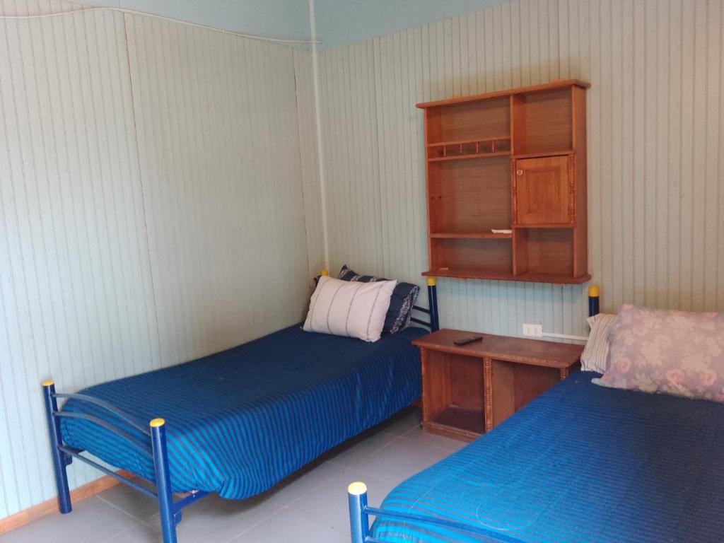 Cama ou camas em um quarto em Nueva Era