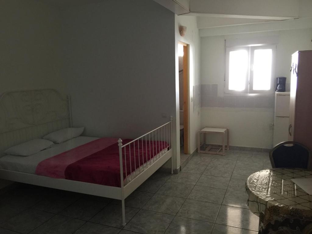 Postel nebo postele na pokoji v ubytování Tenerife Hostel