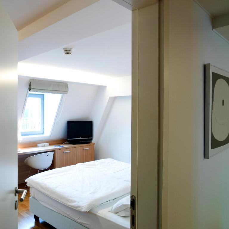 TV a/nebo společenská místnost v ubytování Hotel Simoncini
