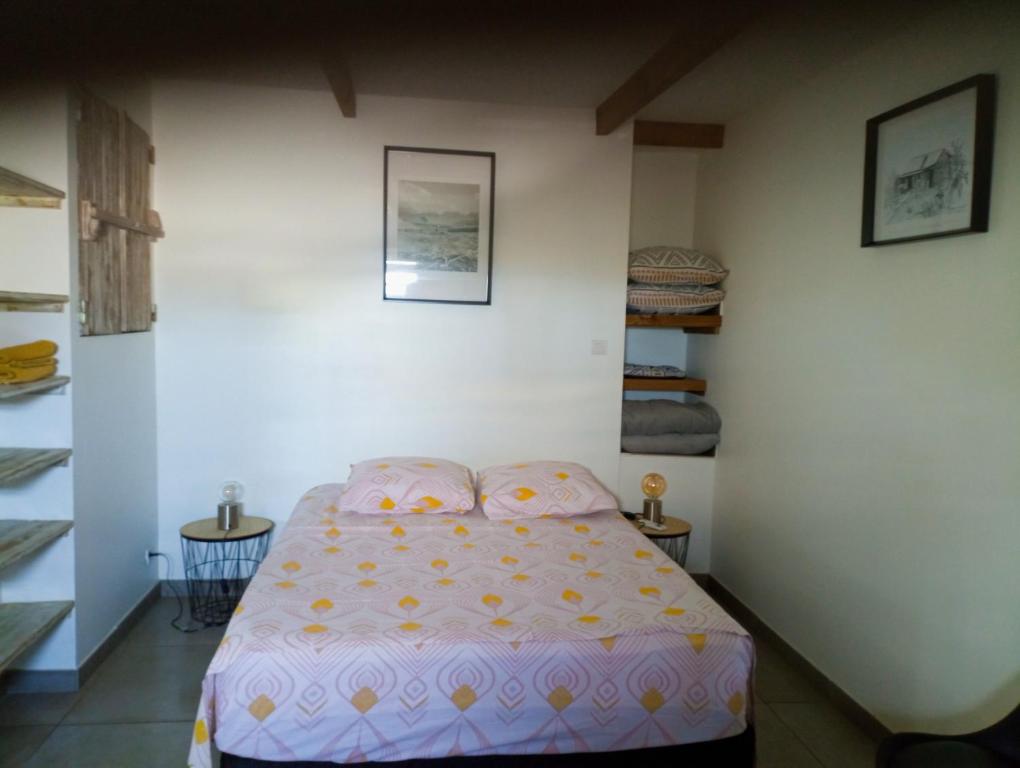 Katil atau katil-katil dalam bilik di Le ti Bali bungalow