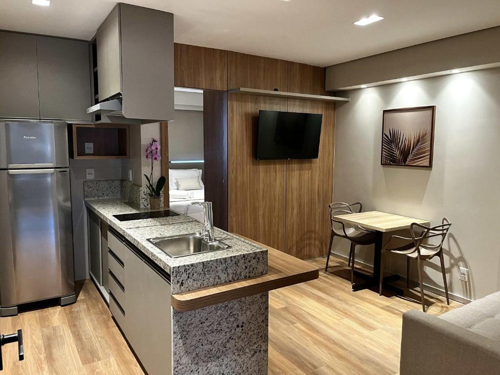 A cozinha ou cozinha compacta de Life Residence