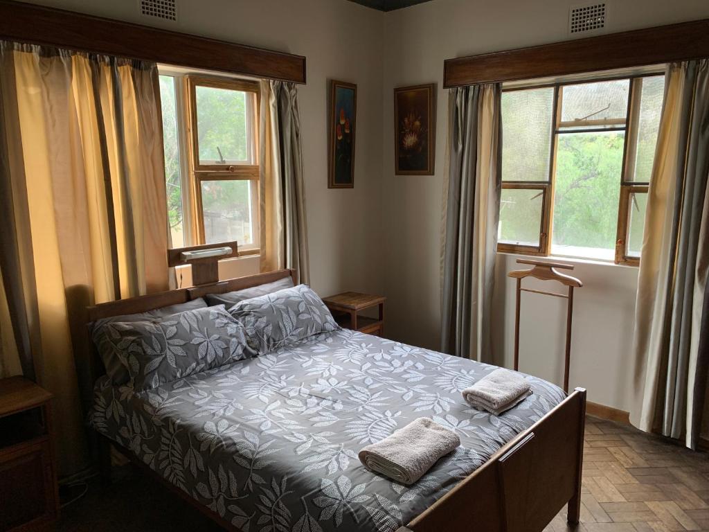Postel nebo postele na pokoji v ubytování Hotel De Rust