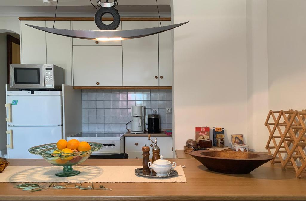 Kuchyňa alebo kuchynka v ubytovaní Gemütliches Appartement in Ano Poli