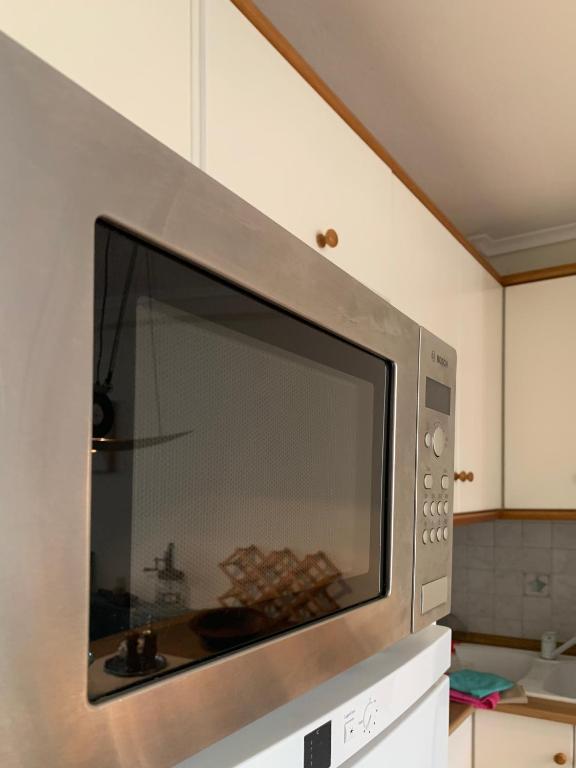 Kuchyňa alebo kuchynka v ubytovaní Gemütliches Appartement in Ano Poli