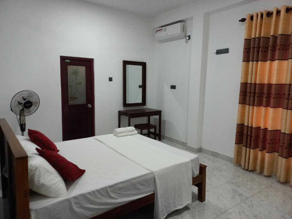 Postel nebo postele na pokoji v ubytování Airport Pearl Garden Transit Hotel
