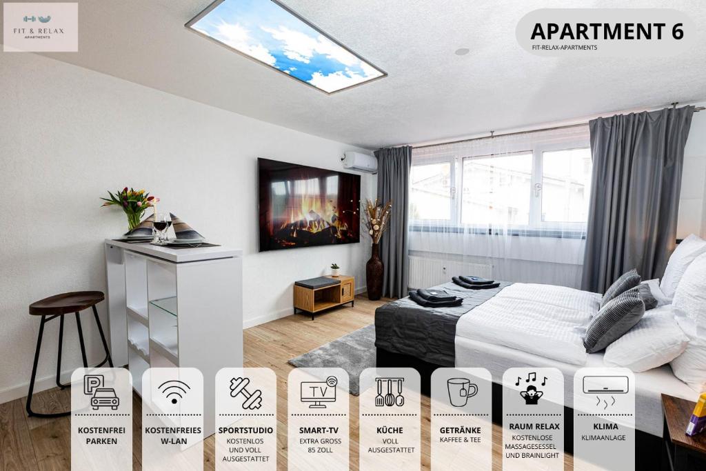 メーアスブルクにあるFit-Relax Apartments Meersburg mit eigenem Sportstudioのベッドルーム1室(ベッド1台、壁掛けテレビ付)