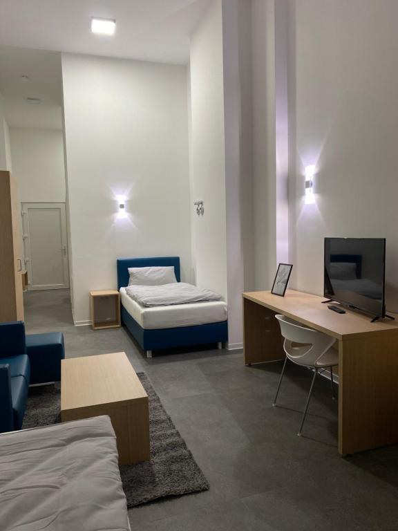 Postel nebo postele na pokoji v ubytování Fabella Flats Forchheim