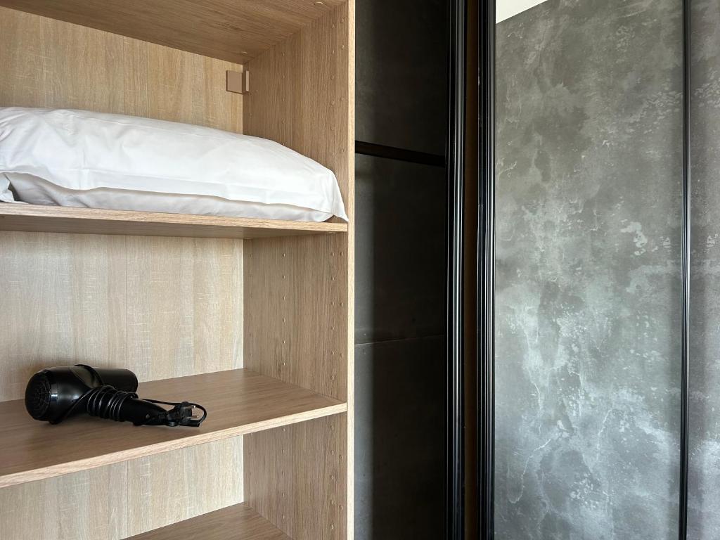 Postel nebo postele na pokoji v ubytování Hôtel Casa Matteu