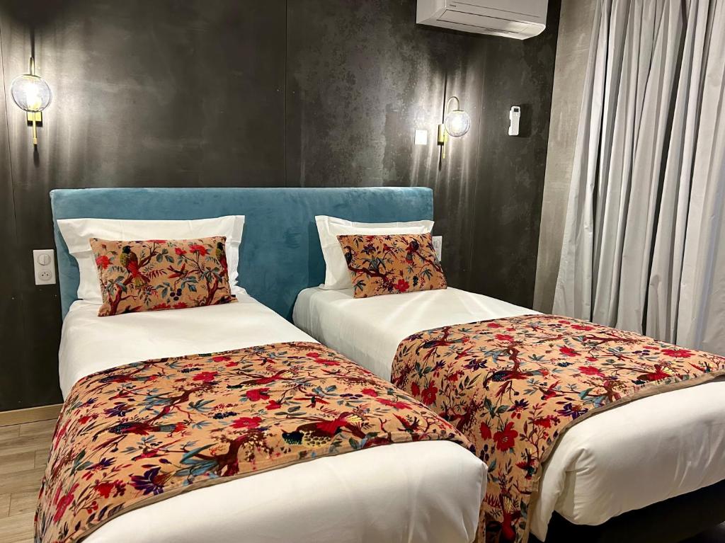 Postel nebo postele na pokoji v ubytování Hôtel Casa Matteu
