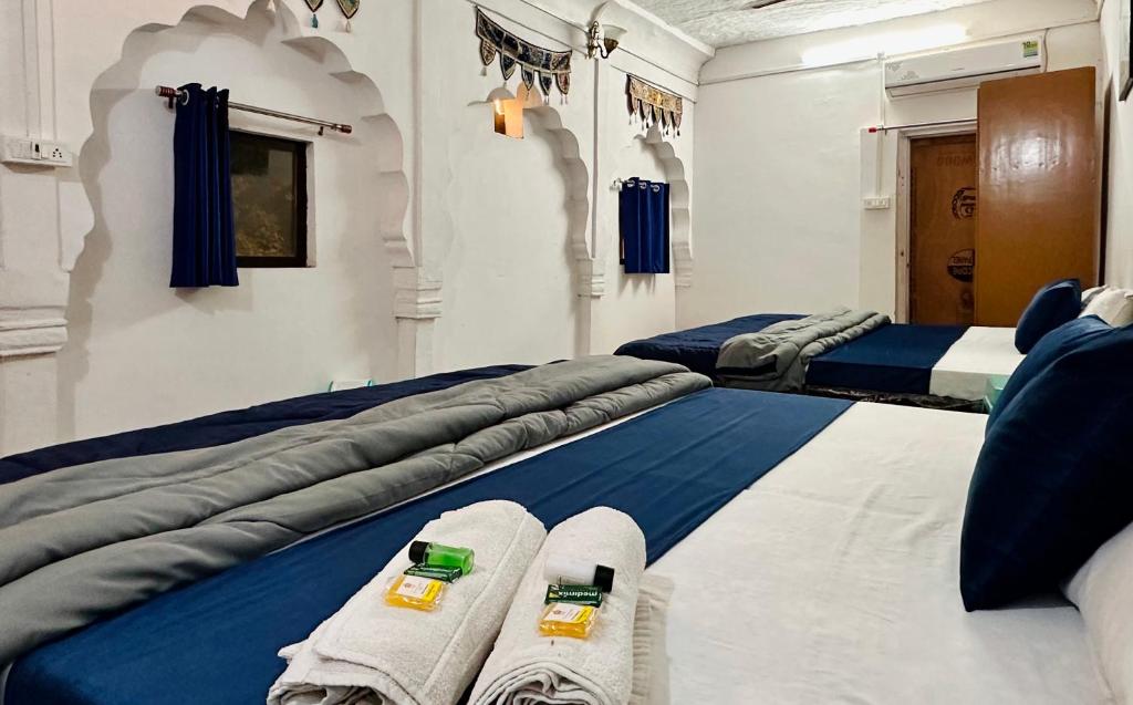 Postel nebo postele na pokoji v ubytování Hotel Kota kunj Heritage