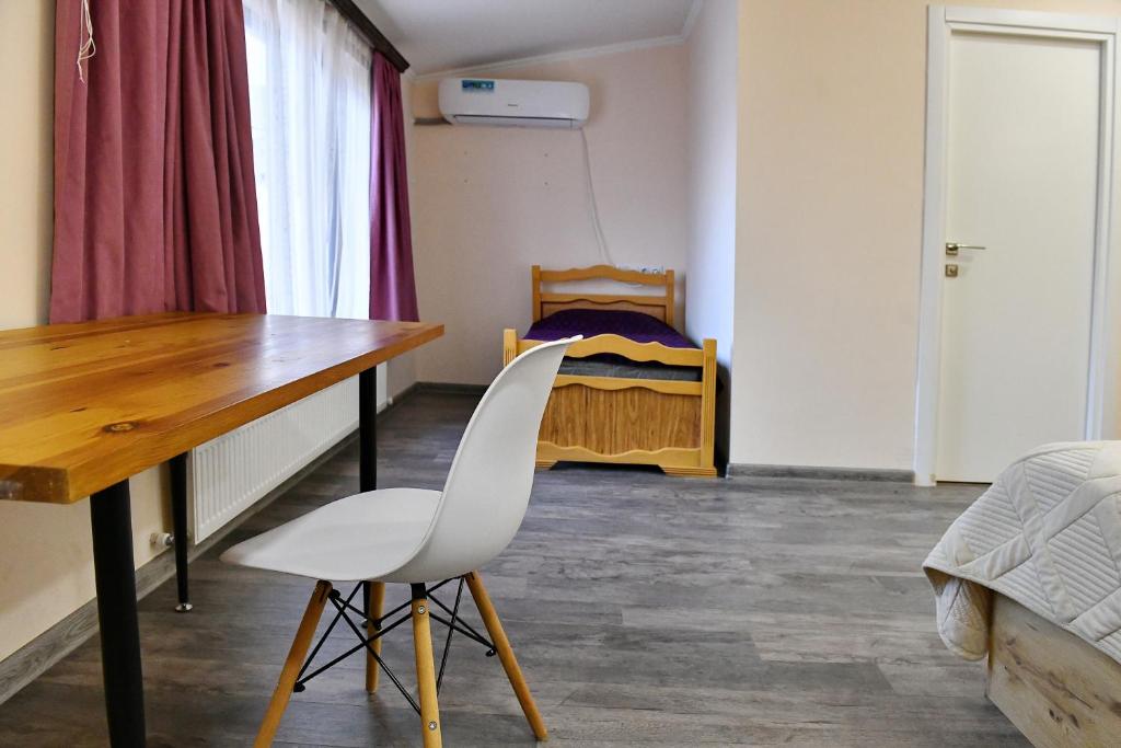 Postel nebo postele na pokoji v ubytování woolway studios