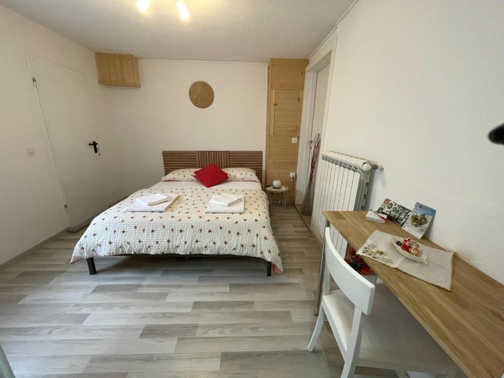 Postel nebo postele na pokoji v ubytování Camera Enaj