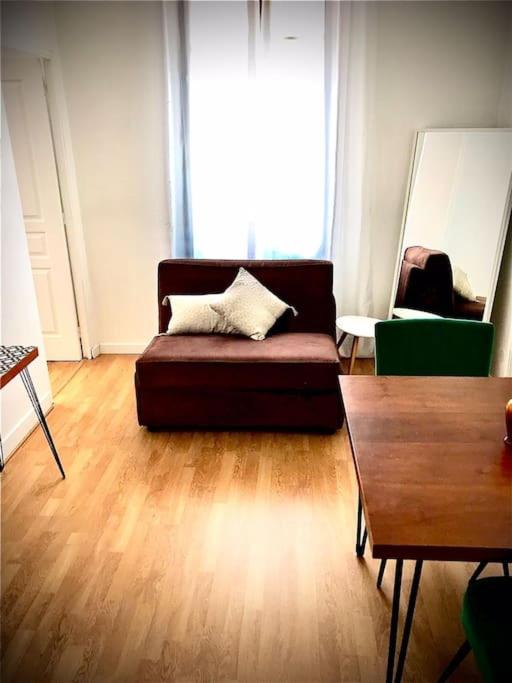 Posezení v ubytování Très joli appartement à Puteaux centre ville