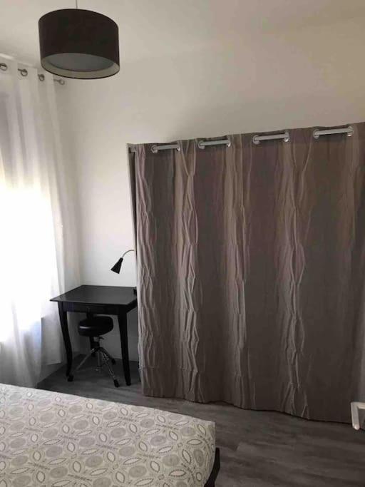 Postel nebo postele na pokoji v ubytování Très joli appartement à Puteaux centre ville