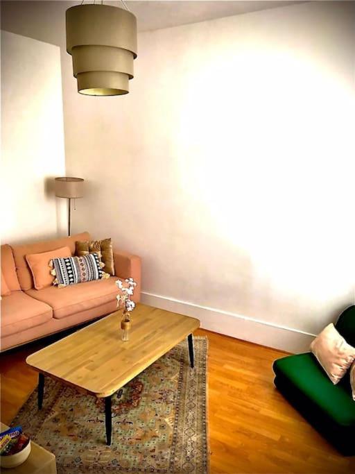 Posezení v ubytování Très joli appartement à Puteaux centre ville